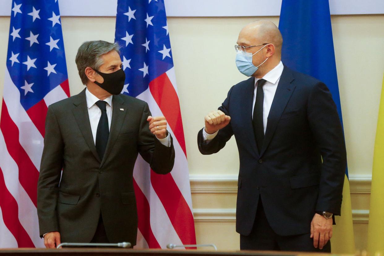 Antony Blinken and Ukraine’s Prime Minister Denis Shmygal greet each other prior to their talks in Kiev (POOL/AFP via Getty Images)