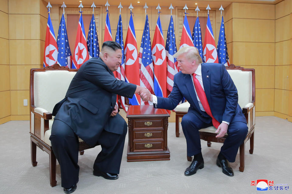 U.S. President Donald Trump and North Korean leader Kim Jong Un shake hands during a meeting at the demilitarized zone (DMZ) separating the two Koreas, in Panmunjom, South Korea, June 30, 2019. KCNA via REUTERS    ATTENTION EDITORS - THIS IMAGE WAS PROVIDED BY A THIRD PARTY. REUTERS IS UNABLE TO INDEPENDENTLY VERIFY THIS IMAGE. NO THIRD PARTY SALES. SOUTH KOREA OUT. NO COMMERCIAL OR EDITORIAL SALES IN SOUTH KOREA.