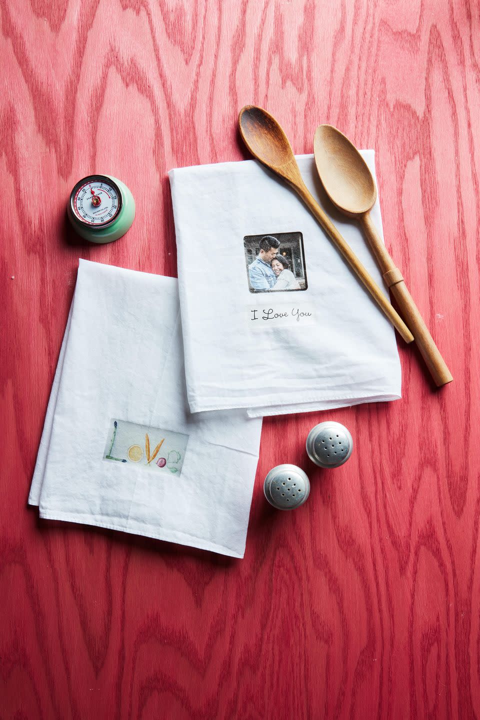 <p>Beautiful and utilitarian, these custom dishtowels will bring love and joy to the most used room in the house—the kitchen. </p><p><strong>To make:</strong> On your computer, design imagery including photographs, if desired. Print on iron-on transfer paper. Cut out around imagery and iron on cotton dishtowels per manufacturer's directions.</p><p><a class="link " href="https://www.amazon.com/TransOurDream-Tru-Transfer-EasyToUse-Transfer-Printable/dp/B08CN3N48H/ref=sr_1_2_sspa?tag=syn-yahoo-20&ascsubtag=%5Bartid%7C10050.g.2971%5Bsrc%7Cyahoo-us" rel="nofollow noopener" target="_blank" data-ylk="slk:SHOP IRON-ON PAPER;elm:context_link;itc:0;sec:content-canvas">SHOP IRON-ON PAPER</a></p>