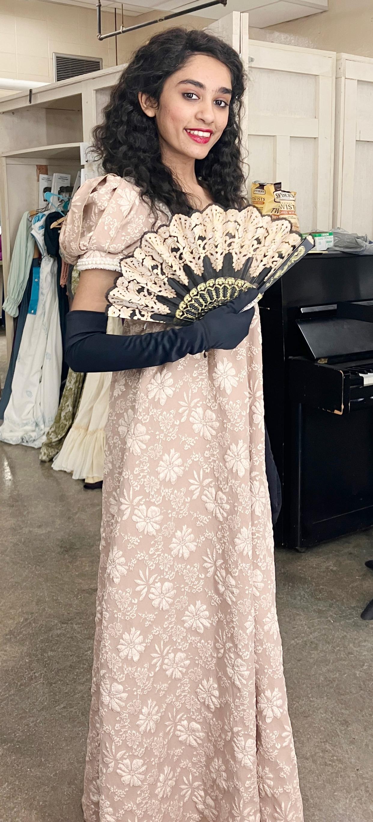 Tiara Abraham poses in one of the outfits for the Indiana University Jacobs School of Music performance of the opera Eugene Onegin.