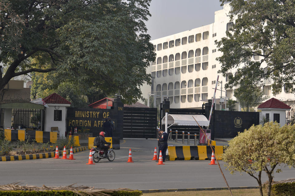 Police officers stand guard at the main entry gate of Pakistan's Ministry of Foreign Affairs, in Islamabad, Pakistan, Thursday, Jan. 18, 2024. Pakistan's air force launched retaliatory airstrikes early Thursday on Iran allegedly targeting militant positions, an attack that killed at least several people and further raised tensions between the neighboring nations. (AP Photo/Anjum Naveed)