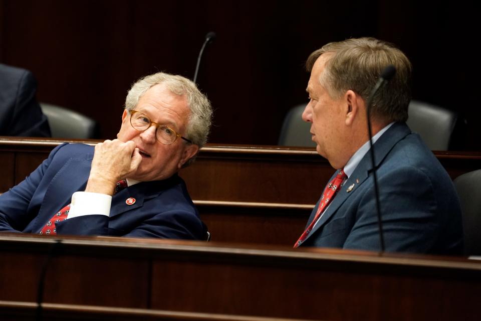 Rep. Mark White, R-Memphis, left, talks with Rep. Sam Whitson, R-Franklin, in 2021. White leads a powerful House education committee, while Whitson has expressed misgivings about an expanded statewide school voucher program.