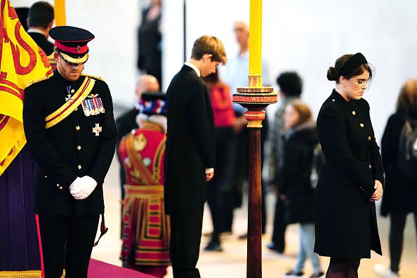 LONDON, ENGLAND - SEPTEMBER 17:  Prince Harry, Duke of Sussex, Princess Eugenie of York and James, Viscount Severn (C) hold a vigil in honour of Queen Elizabeth II at Westminster Hall on September 17, 2022 in London, England. Queen Elizabeth II's grandchildren mount a family vigil over her coffin lying in state in Westminster Hall. Queen Elizabeth II died at Balmoral Castle in Scotland on September 8, 2022, and is succeeded by her eldest son, King Charles III. (Photo by Aaron Chown-WPA Pool/Getty Images)