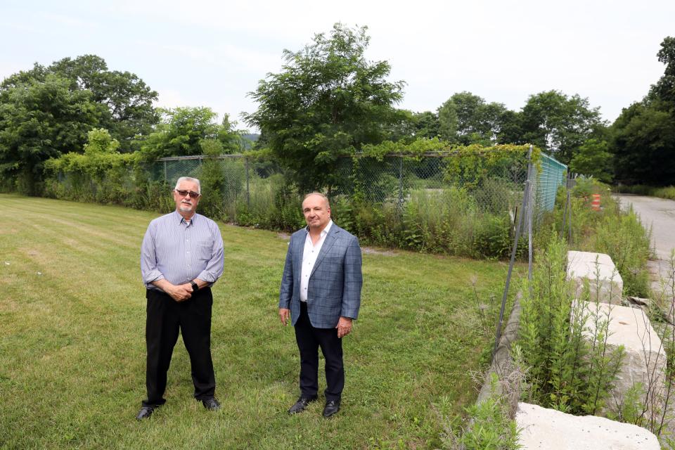 Mount Pleasant Town Supervisor Carl Fulgenzi, left, and developer John Fareri stand at the site of the future North 80 biotech center in Valhalla, July 13, 2023. The biotech campus will include medical offices, restaurants, a hotel and a STEM education center. 