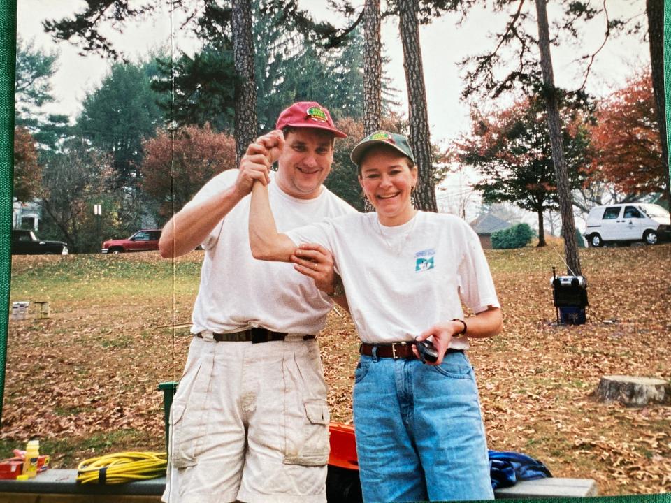 A photo of Tom and Diane Knoebber at the 1999 build of the Jones Park playground. They were head volunteers for the community build.