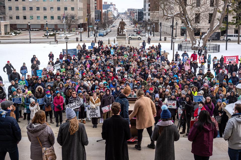 A few hundred people attend the Roe v. Wade Memorial March at the state Capitol in Lansing Saturday, Jan. 28, 2023.