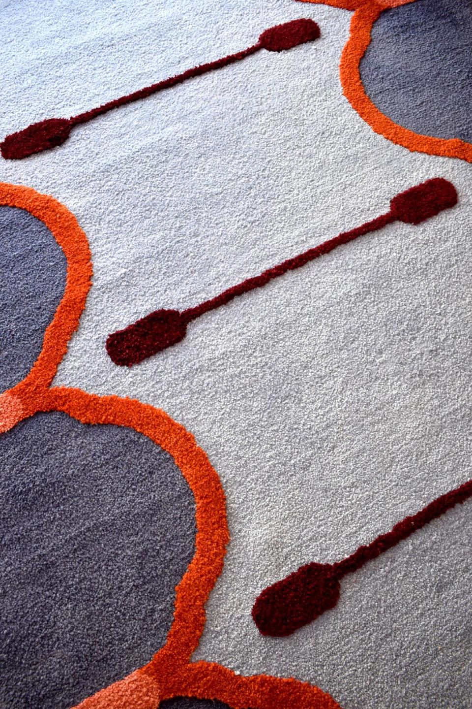 The Javits Center’s concrete floors are the perfect foundation to display custom rugs like Curve, by Look Book designer Tomma Bloom