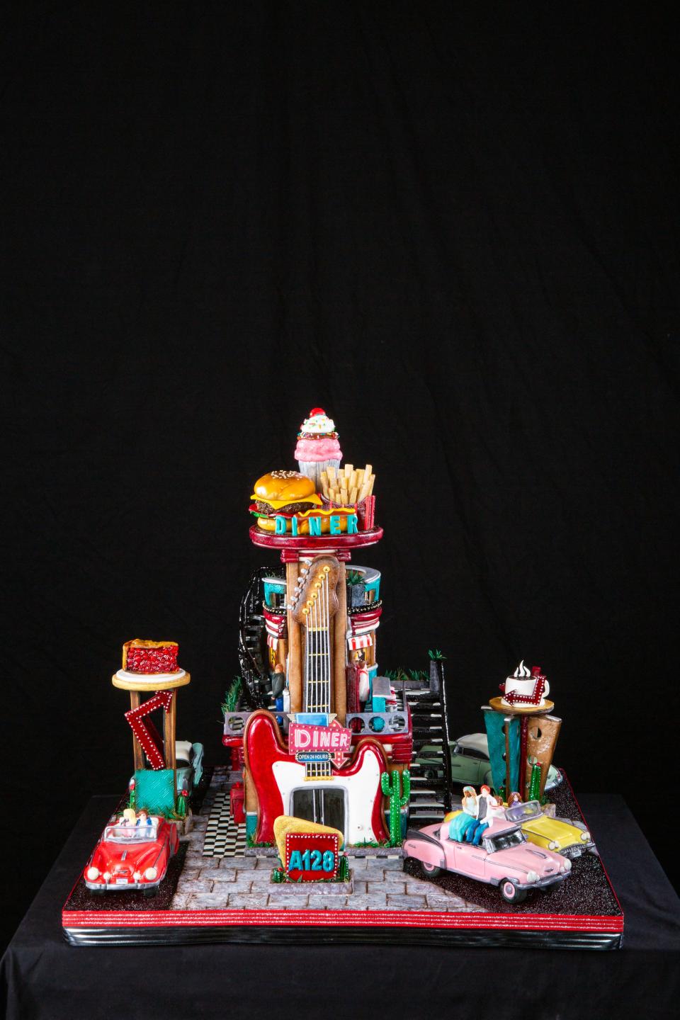 The 31st National Gingerbread House Competition People's Choice: Best in Show Award was presented to the team Love at Frost Sight, of Woodbury, Minnesota, for their creation, “Rockin’ at the Diner."