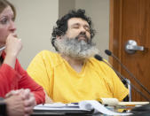 Anthony Garcia appears unresponsive at the Douglas County Court in Omaha, Neb., Friday, Sept. 14, 2018. Garcia, a former doctor, was convicted in the revenge killings of four people connected to the Creighton University School of Medicine, and has been sentenced by a three-judge panel to death. The first victims were the son and housekeeper of a faculty member at Creighton University School of Medicine in Omaha. Garcia also was found guilty in the 2013 deaths of another Creighton pathology doctor and his wife. (Kent Sievers/Omaha World-Herald via AP, Pool)