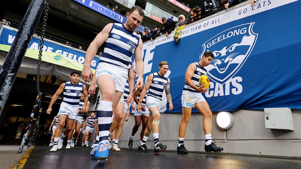 Geelong take to the field.