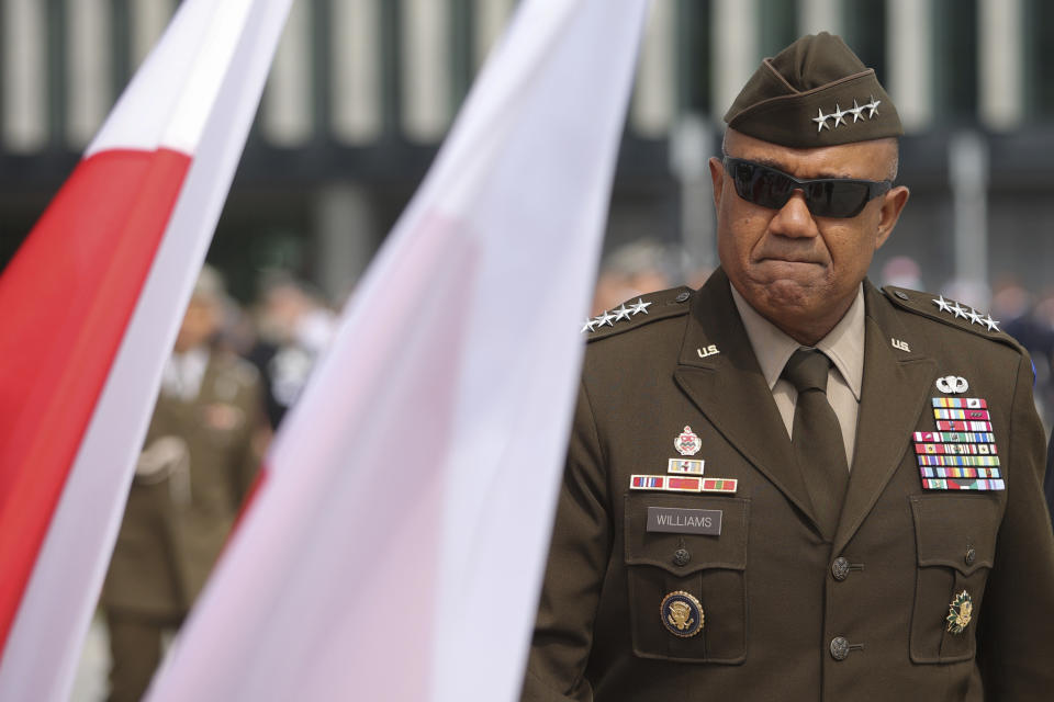 Gen. Darryl Williams, the new commanding general of United States Army Europe and Africa attend the ceremony marking Polish Army Day in Warsaw, Poland, Monday, Aug. 15, 2022. The Polish president and other officials marked their nation's Armed Forces Day holiday Monday alongside the U.S. army commander in Europe and regular American troops, a symbolic underlining of NATO support for members on the eastern front as Russia wages war nearby in Ukraine. (AP Photo/Michal Dyjuk)