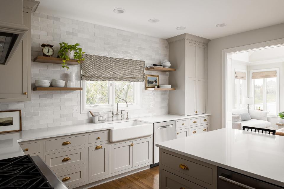 Small, everyday appliances, like the coffee maker, are tucked away in the appliance cabinet, keeping the counter space clear of clutter in this renovated kitchen at a home in the Hillcrest subdivision of Prospect.