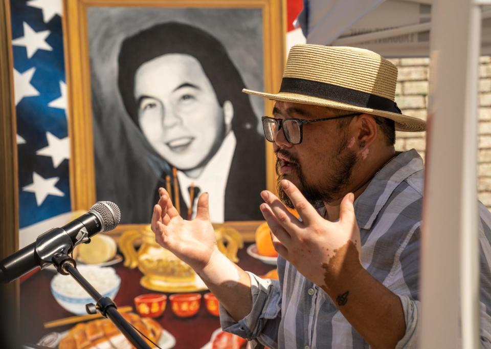 Artist Anthony Lee, of Madison Heights talks about the 11' x14' standing wall art painting he made in memory of Vincent Chin, during a 40th-anniversary observance of Chin's death at the corner of Cass avenue and Peterboro street in Detroit's former Chinatown area on Wednesday, June 15, 2022. Chin was was beaten to death by two white men with a baseball bat in 1982. His killers received no jail time.