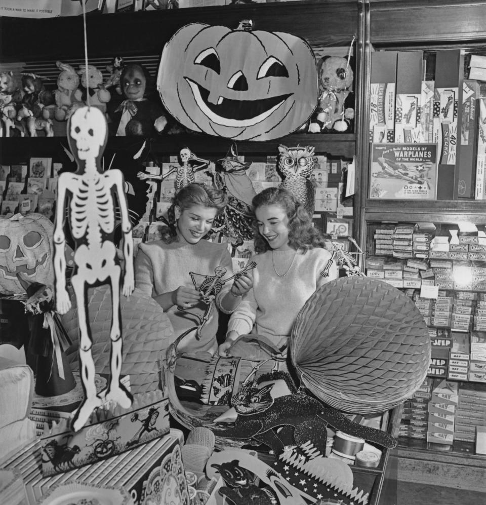 <p>In the '40s, novelty stores like the one pictured here sold a variety of paper decorations in different shapes: skeletons, jack-o'-lanterns, black cats, owls, and more. </p>