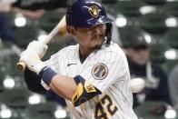 Milwaukee Brewers' Keston Hiura is hit by a pitch during the fifth inning of a baseball game against the Pittsburgh Pirates Friday, April 16, 2021, in Milwaukee. (AP Photo/Morry Gash)