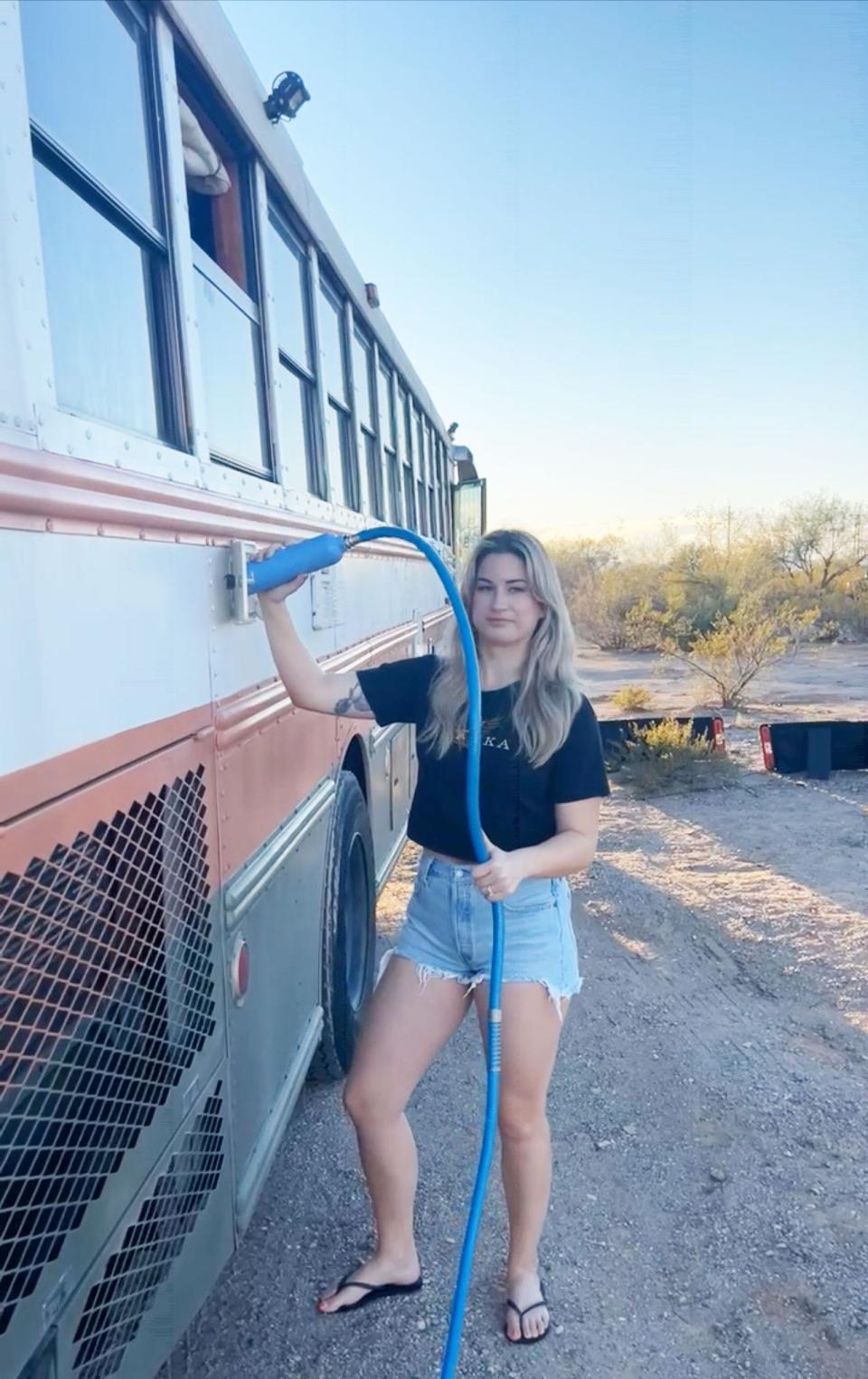 nicole jones water tank on renovated school bus