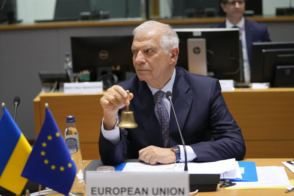 European Union foreign policy chief Josep Borrell rings a bell to signify the start of a roundtable meeting during the EU-Ukraine Association Council at the European Council building in Brussels, Wednesday, March 20, 2024. (AP Photo/Virginia Mayo)