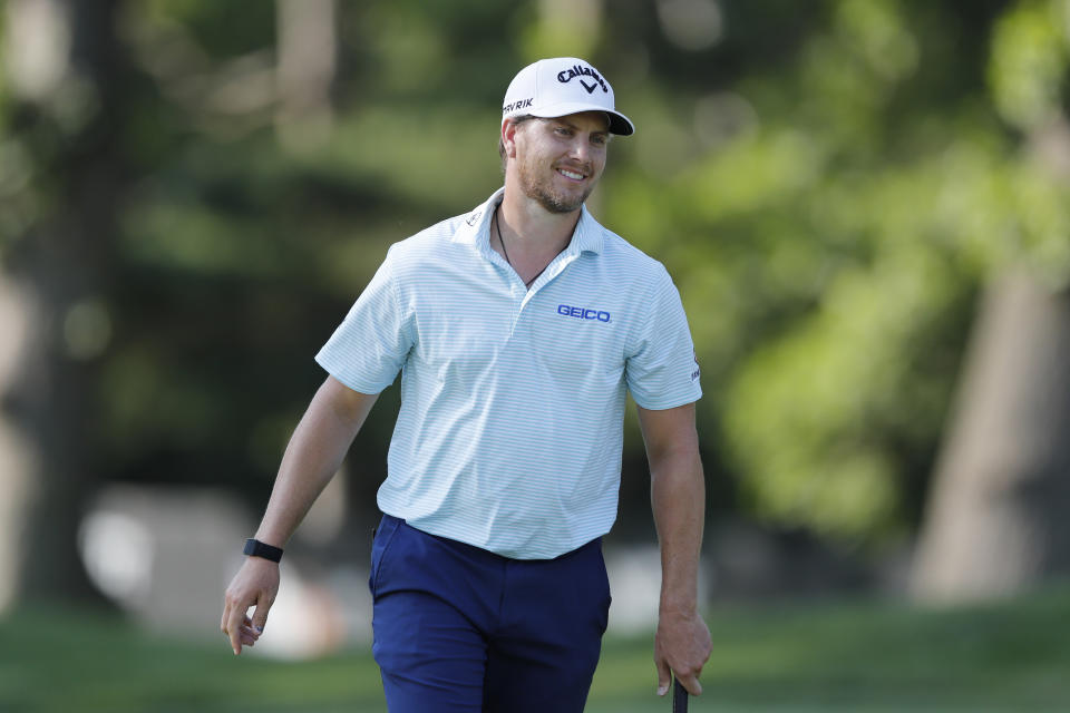 Chris Stroud approaches his ball on the ninth green during the first round of the Rocket Mortgage Classic golf tournament Thursday, July 2, 2020, at Detroit Golf Club in Detroit. (AP Photo/Carlos Osorio)