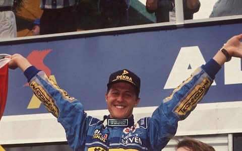 Michael Schumacher celebrates his 1994 world championship - Credit: Bongarts/Alexander Hassenstein