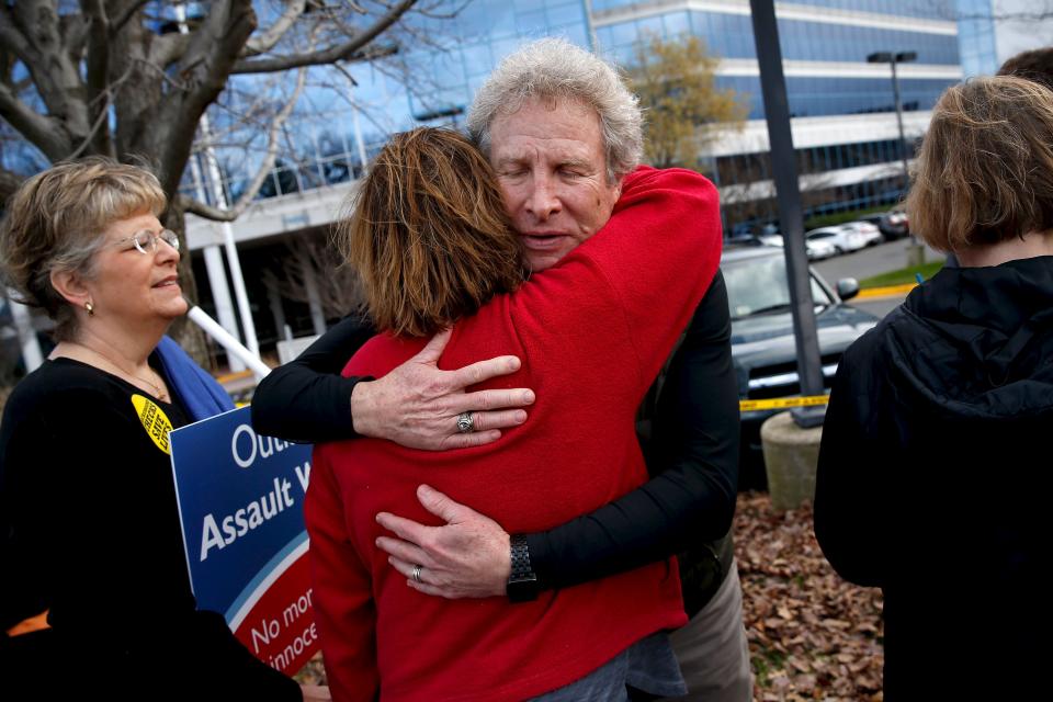 Andy Parker, whose daughter Alison Parker was shot and killed on air during a live television segment in August, takes part in a protest and vigil against gun violence on the third anniversary of the Sandy Hook mass shooting, outside the National Rifle Association (NRA) headquarters in Fairfax, Virginia December 14, 2015. REUTERS/Jonathan Ernst