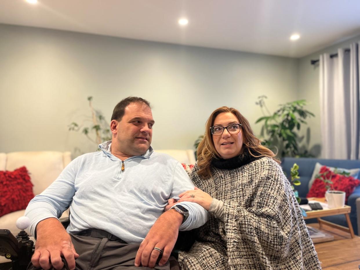 Rodney and Deanna Hodgins are pictured at their home in Prince George, B.C. The Canadian Transportation Agency has launched an investigation into their experience on an Air Canada flight to Las Vegas.  (Andrew Kurjata/CBC - image credit)
