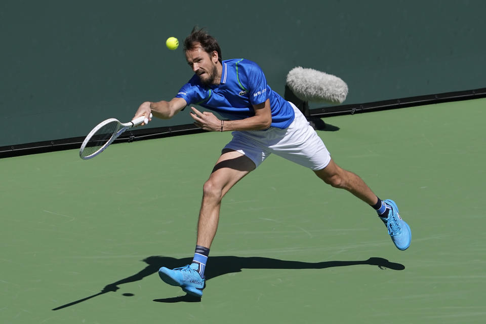 Daniil Medvedev, of Russia, returns a shot against Frances Tiafoe, of the United States, during a semifinal match at the BNP Paribas Open tennis tournament Saturday, March 18, 2023, in Indian Wells, Calif. (AP Photo/Mark J. Terrill)