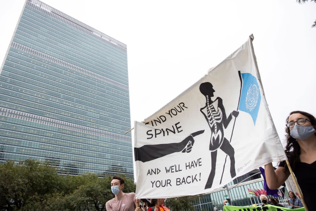 Extinction Rebellion staged a climate emergency protest outside the UN ahead of its general assembly  (Reuters)