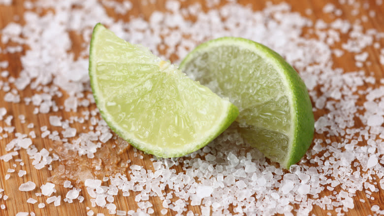 Lime wedges sitting in salt