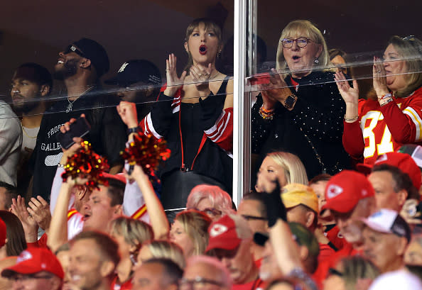 KANSAS CITY, MISSOURI – OCTOBER 12: Taylor Swift and Donna Kelce cheer before the game between the Kansas City Chiefs and the Denver Broncos at GEHA Field at Arrowhead Stadium on October 12, 2023 in Kansas City, Missouri. (Photo by Jamie Squire/Getty Images)