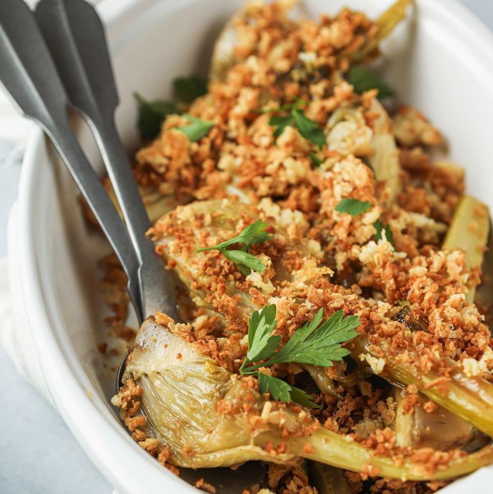 <p>Braised fennel and Parm breadcrumbs... where do we sign?</p><p>Get the <a href="https://www.delish.com/uk/cooking/recipes/a39291622/braised-fennel/" rel="nofollow noopener" target="_blank" data-ylk="slk:Braised Fennel with Crispy Parmesan Breadcrumbs;elm:context_link;itc:0;sec:content-canvas" class="link ">Braised Fennel with Crispy Parmesan Breadcrumbs</a> recipe.</p>
