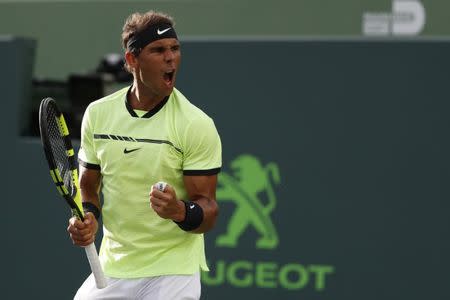 Mar 26, 2017; Miami, FL, USA; Rafael Nadal of Spain reacts after winning a game against Philip Kohlschreiber of Germany (not pictured) on day six of the 2017 Miami Open at Crandon Park Tennis Center. Mandatory Credit: Geoff Burke-USA TODAY Sports