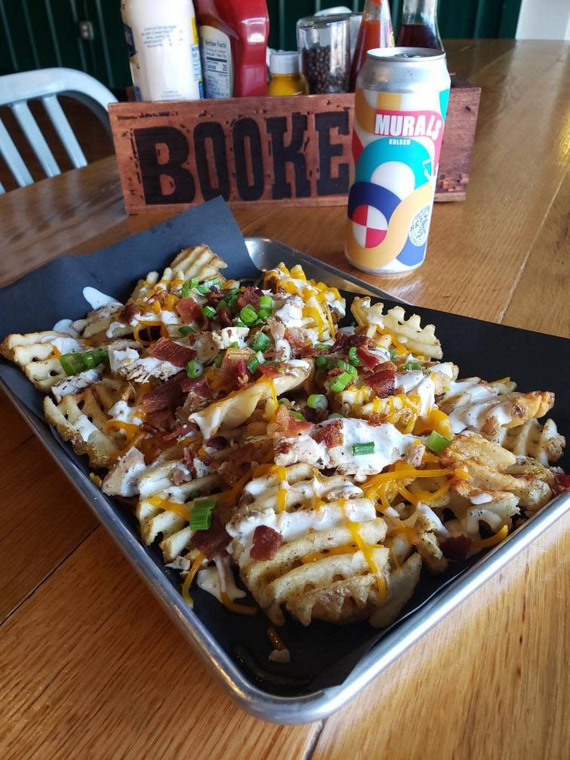 Here’s the entry from Piedmont Brewing & Kitchen for the Downtown Macon French Fry Fight on Wednesday: Chicken bacon ranch fries, waffle fries topped with shredded cheddar, smoked chicken, bacon, ranch dressing and garnished with green onions.