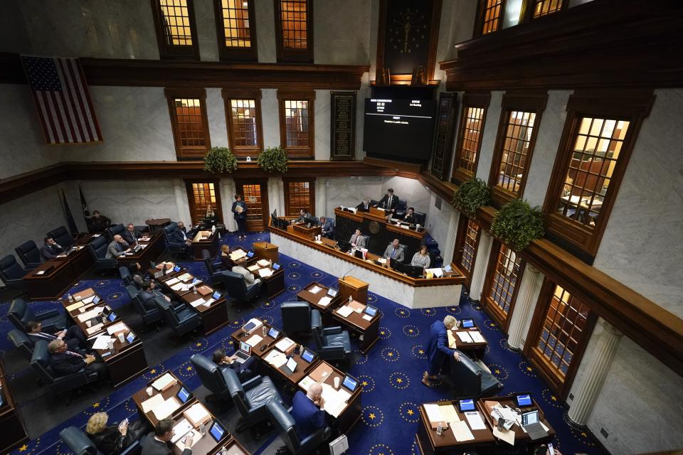 Senators meet in the senate chamber at the Statehouse, Thursday, Feb. 1, 2024, in Indianapolis. (AP Photo/Darron Cummings)