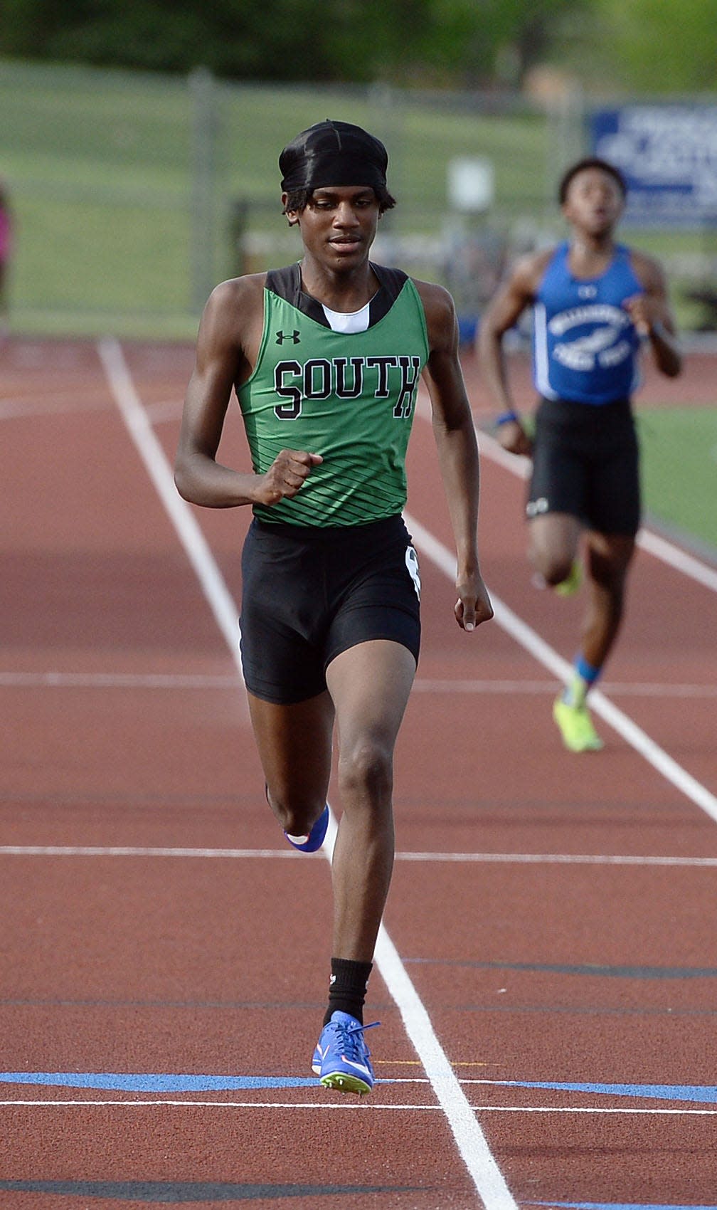 South Hagerstown's Deontae Blake heads to the finish line to win the boys 400-meter dash during the Washington County Track & Field Championships. Blake also won the 200.