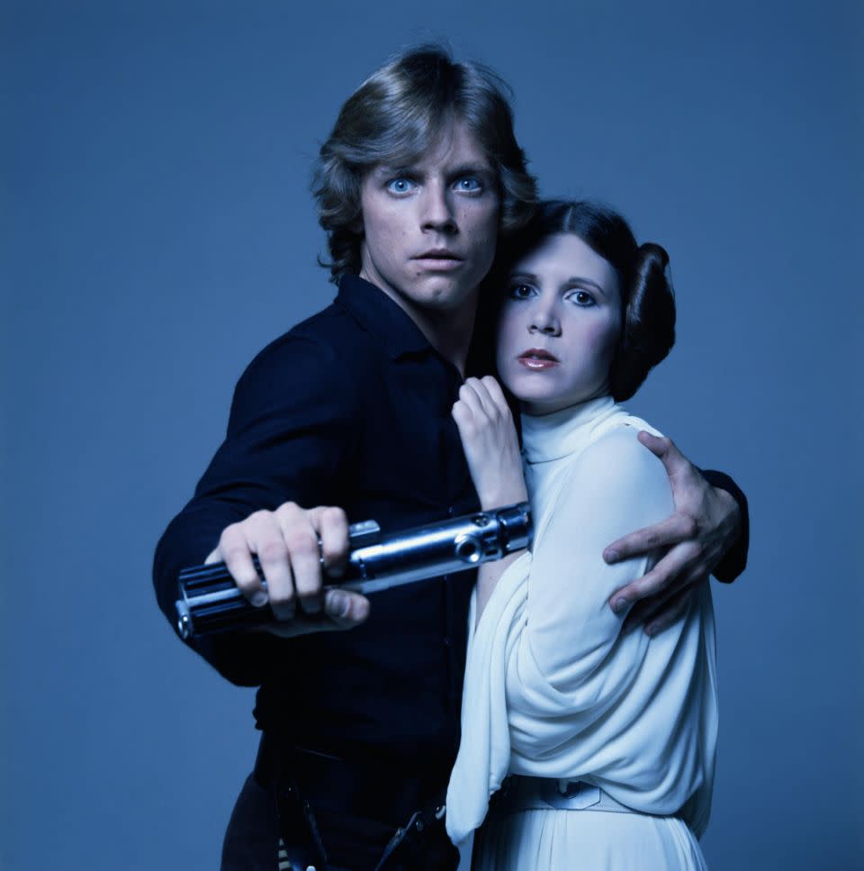 Carrie as Leia in the original Star Wars movie, alongside her screen brother Luke Skywalker. Source: Getty