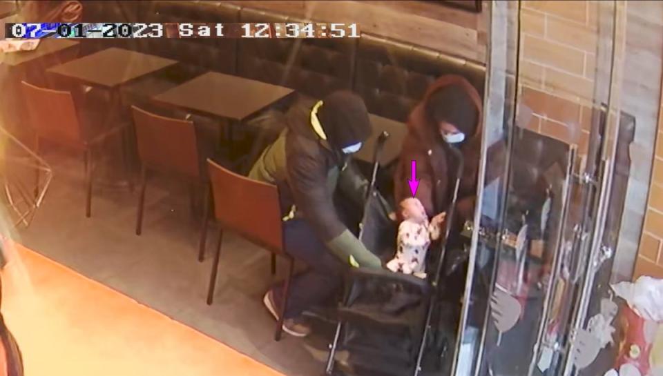 CCTV footage of Constance Marten, Mark Gordon and baby Victoria in a German doner kebab shop in East Ham, London (PA)