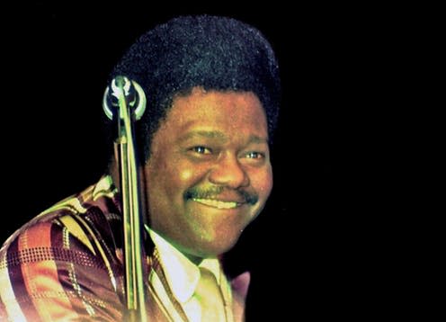 <span class="caption">Trailblazer: Fats Domino helped break down racial divides in American pop music.</span> <span class="attribution"><span class="source">Klaus Hiltscher via Wikimedia Commons</span>, <a class="link " href="http://creativecommons.org/licenses/by-sa/4.0/" rel="nofollow noopener" target="_blank" data-ylk="slk:CC BY-SA;elm:context_link;itc:0;sec:content-canvas">CC BY-SA</a></span>