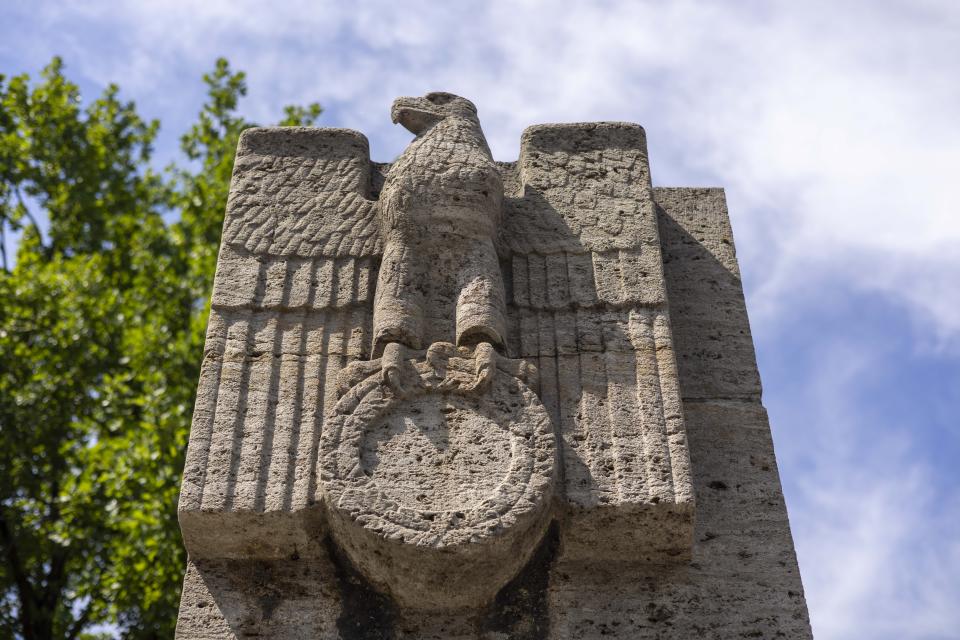 A Nazi eagle with its swastika removed on a pillar outside Berlin's Olympiastadion, Wednesday, July 10, 2024. Scars of World War II and relics from its Nazi past are preserved at Berlin's Olympiastadion. When Spain plays England in the European Championship final, they will be playing in a stadium that doesn't hide it was built by the Nazis for the 1936 Olympic Games. (AP Photo/Ciaran Fahey)