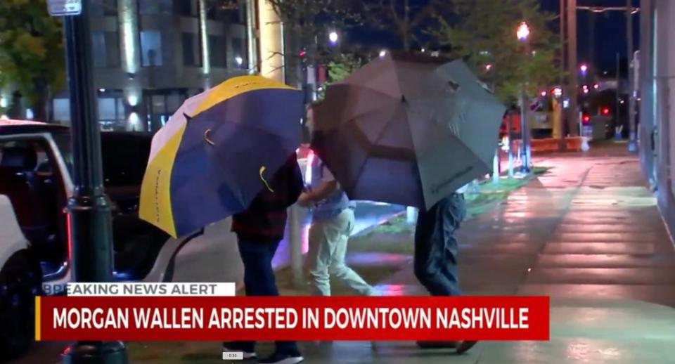 According to officers at the scene, the chair allegedly thrown by the singer landed three feet away from them. WKRN
