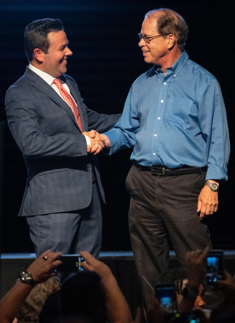 Republican nominee for lieutenant governor Micah Beckwith is congratulated by Sen. Mike Braun, the Republican nominee for governor, Saturday, June 15, 2024, during the 2024 Indiana GOP State Convention in Indianapolis, Ind.