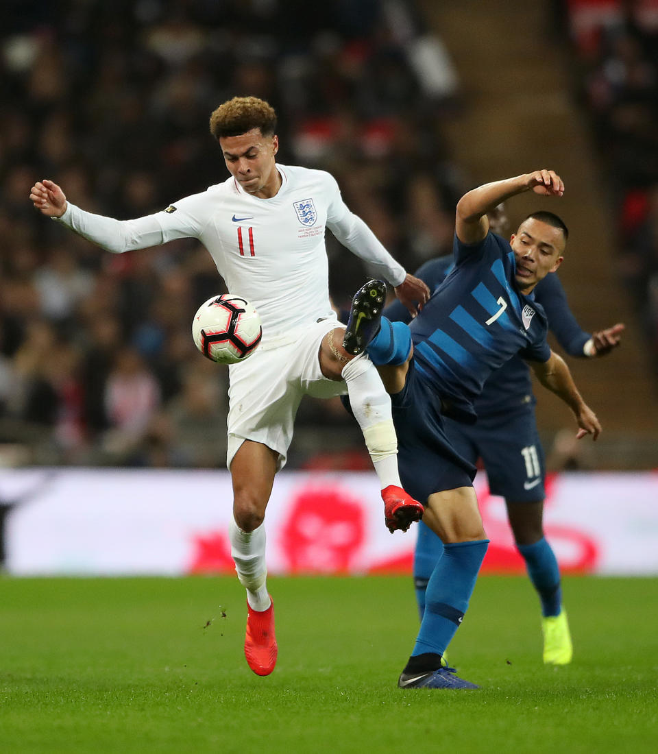 Bobby Wood (right) battles England’s Dele Alli (left) during last week’s friendly in London. (Nick Potts/Getty)