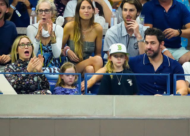 <p> Gotham/GC</p> Emily Blunt and John Krasinski attend the 2023 U.S. Open with their daughters.