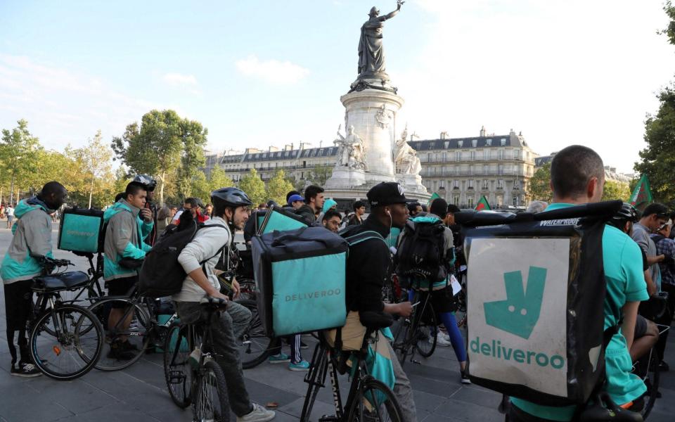 Deliveroo riders demonstrating in Paris - &#xa0;JACQUES DEMARTHON / AFP