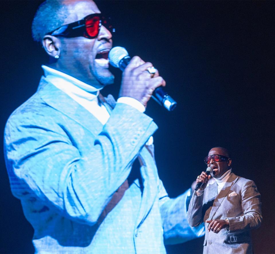 Recording artist Johnny Gill performs " A Change is Gonna Come" at a celebration of life for Jim Brown held at McKinley High School Thursday.