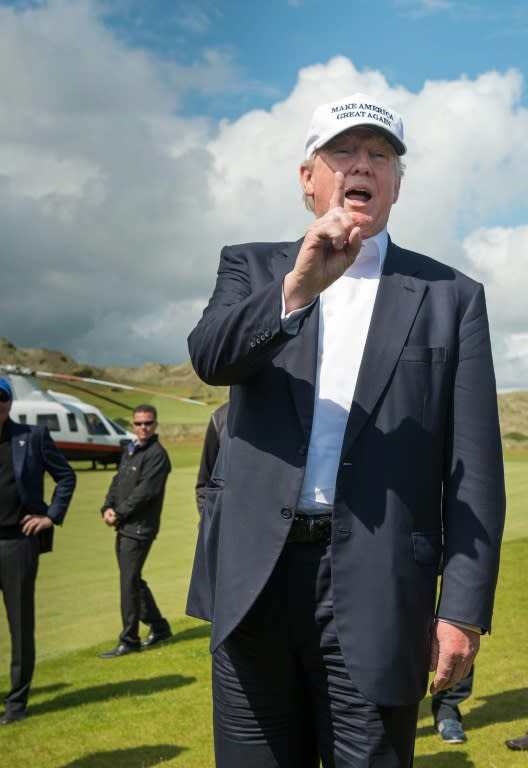 Presumptive Republican presidential nominee Donald Trump speaks to members of the media during a tour of his International Golf Links on June 25, 2016