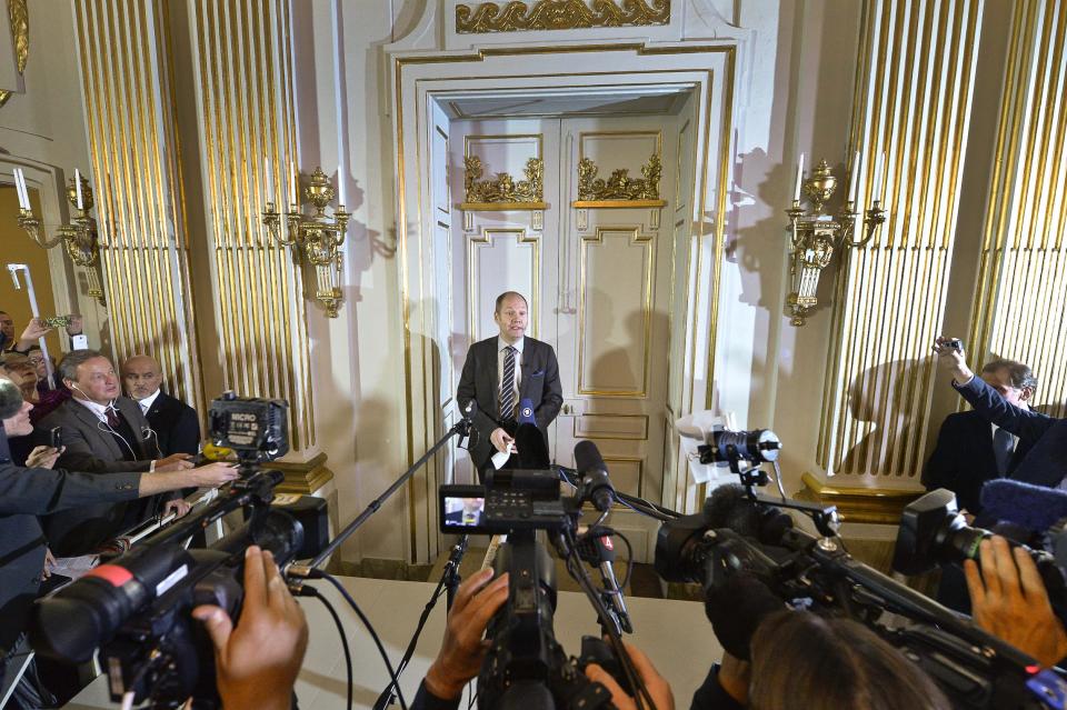 Peter Englund, permanent secretary of the Royal Swedish Academy, steps out from the Academy rooms in Stockholm, Sweden Thursday Oct. 10, 2013 to announce the Nobel literature prizewinner 2013 to be Canada's Alice Munro. (AP Photo/Anders Wiklund) ** SWEDEN OUT **