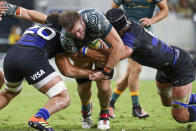 Australia's Izack Rodda is tackled by defenders during the Rugby Championship test match between the Pumas and the Wallabies in Townsville, Australia, Saturday, Sept. 25, 2021. (AP Photo/Tertius Pickard)