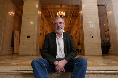 Sinn Fein's Gerry Adams poses for a photograph as he leaves Parliament buildings at Stormont for the last time in his role as Sinn Fein President in Belfast, Northern Ireland, February 9, 2018. REUTERS/Clodagh Kilcoyne