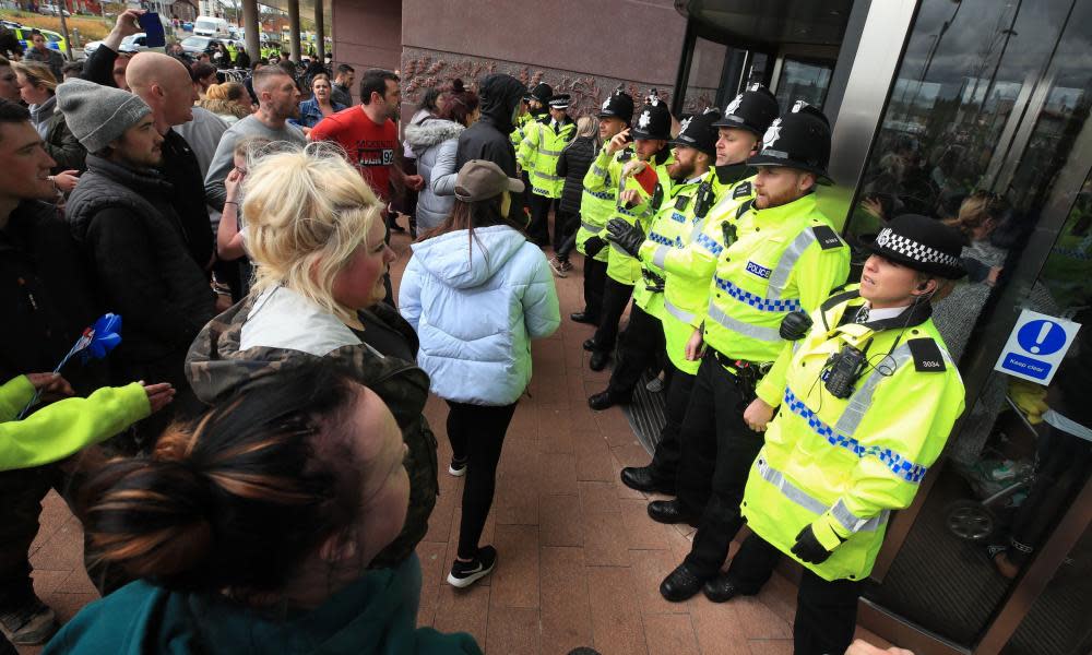 Protesters and police at Alder Hey children’s hospital, Liverpool, on 23 April.