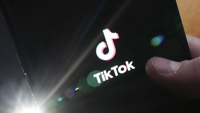 The TikTok startup page is displayed on an iPhone in Ottawa, Ontario, Feb. 27, 2023. The Montana Senate advanced a bill that would place a ban TikTok statewide on March 3, 2023.